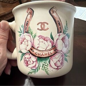 CHANEL Cream Mug with Pink Floral and Horseshoe Design